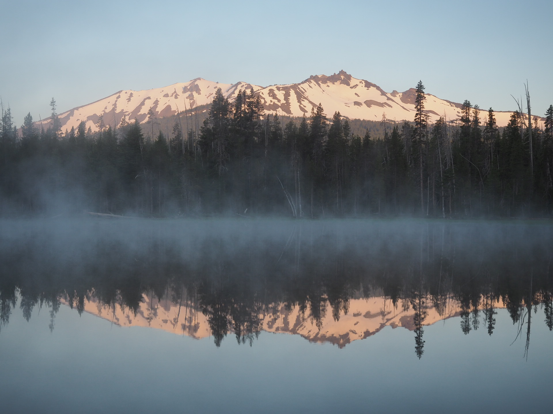 Diamond Peak reflected in Diamond View Lake at sunrise